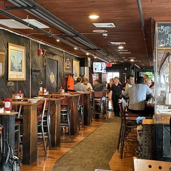 Boston Sail Loft - Facing the front door from my seat halfway down the restaurant. - Bars Near Me - Boston, Massachusetts