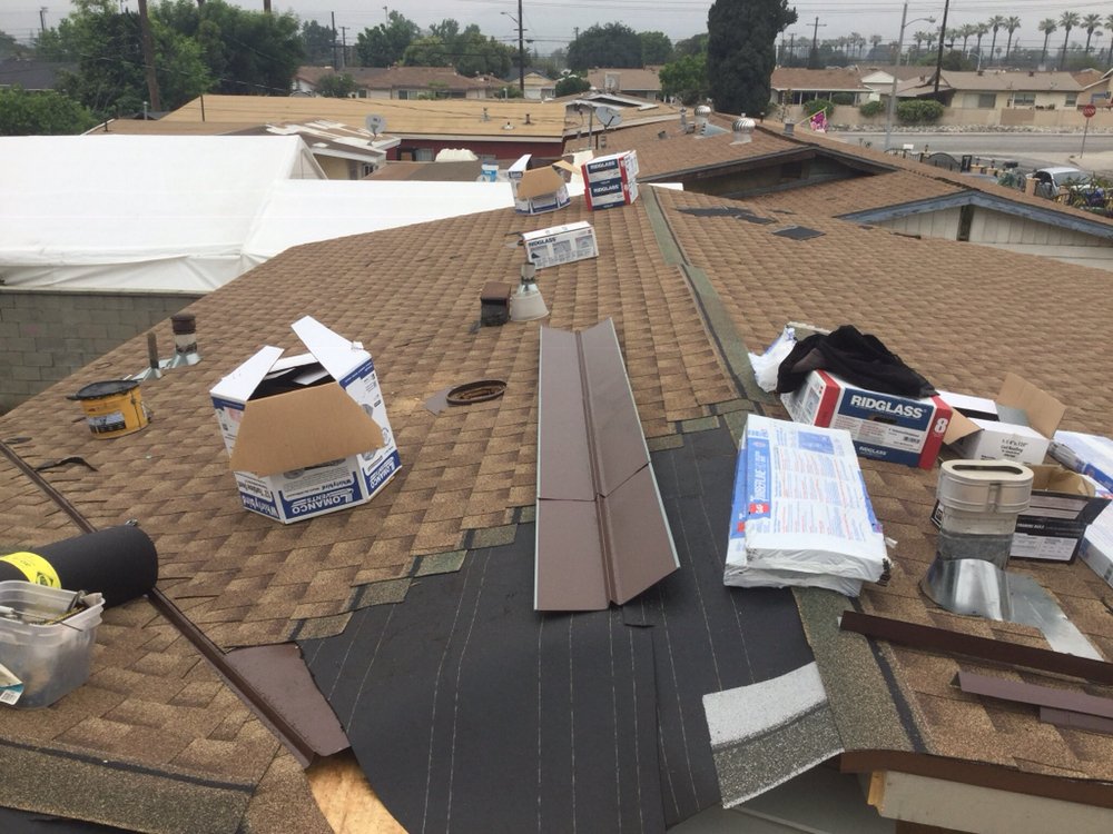 Slide of MA Roofing and Gutters