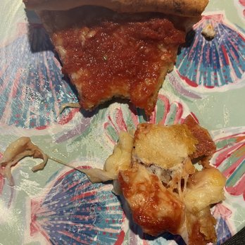 Four Seas Pizza & Restaurant - a slice of pizza on a plate - Pizza Near Me - Rising Sun, Maryland Four Seas Pizza & Restaurant - a slice of pizza on a plate - Pizza Near Me - Rising Sun, Maryland