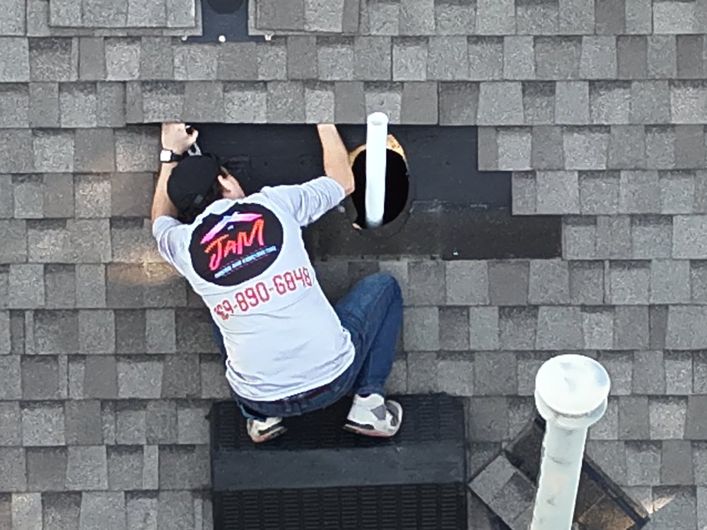 Slide of JaM Roofing and Construction