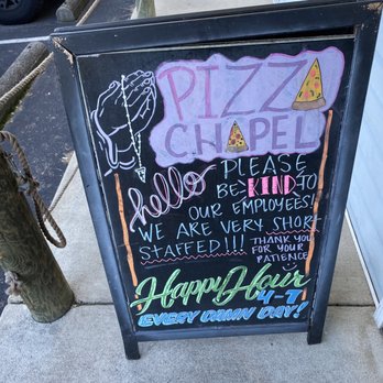 Pizza Chapel - a chalkboard sign on a sidewalk - Bars Near Me - Virginia Beach, Virginia Pizza Chapel - a chalkboard sign on a sidewalk - Bars Near Me - Virginia Beach, Virginia