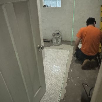 Hernandez & Iker H Tile - Herringbone tile in progress - Flooring Near Me