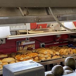 Roger's Deli & Donuts - Behind counter: breads