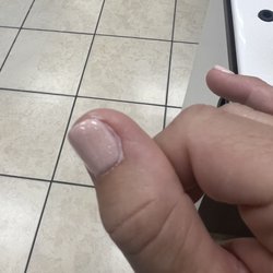 Natural Nails & Spa - Every nail with embarrassing spillover.