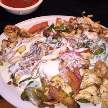Las Margaritas - Shrimp and chicken fajitas with rice and cheese sauce - Mexican Near Me - O'Fallon, Missouri Las Margaritas - Shrimp and chicken fajitas with rice and cheese sauce - Mexican Near Me - O'Fallon, Missouri