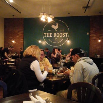 The Roost - Just a great logo wall... - Bars Near Me - Longmont, Colorado