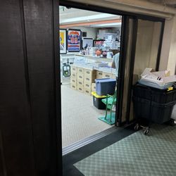 Bergie's Sports Card Dugout - Entrance to store in basement of building.