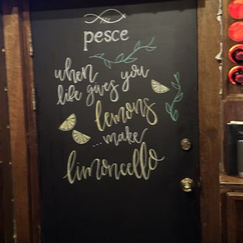 Pesce iTALiAN - Cute sign on door behind the bar - Diners Near Me - St Thomas, Virgin Islands