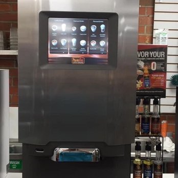 Tank N Tummy - a coffee machine in a store - Videos & Video Game Rental Near Me - Cleveland, Oklahoma