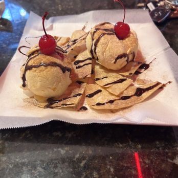 Vallarta Restaurant - Vanilla cinnamon ice cream drizzled with chocolate sauce with buñuelos - Mexican Near Me - San Leandro, California Vallarta Restaurant - Vanilla cinnamon ice cream drizzled with chocolate sauce with buñuelos - Mexican Near Me - San Leandro, California