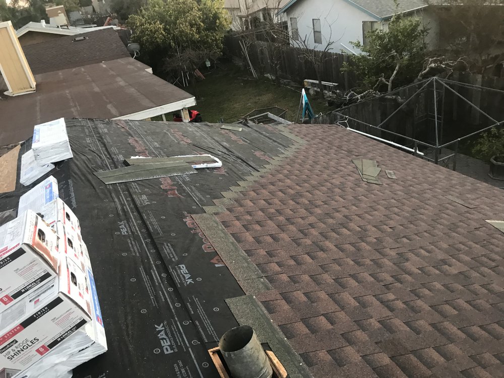 Slide of RidgeValley Roofing