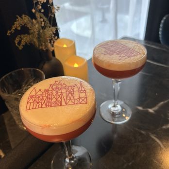 Broken Spirits-Anaheim - It's a small world drink, the foam is dole whip! - Cocktail Bars Near Me - Anaheim, California Broken Spirits-Anaheim - It's a small world drink, the foam is dole whip! - Cocktail Bars Near Me - Anaheim, California
