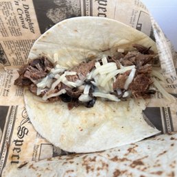 This taco looks very plain. It is, because they ran out of fancy stuff.  Never mind that. PUT THIS IN YOUR MOUTH & cry with joy.