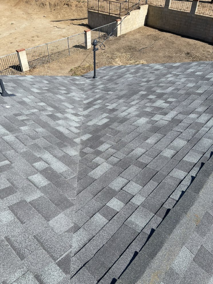 Slide of Manna Roofing Company