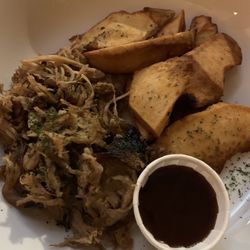 Roasted Breadfruit Smokehouse and Grill - Pulled pork with fried breadfruit.