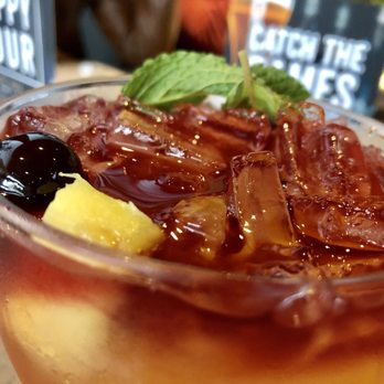 Yard House - Sunset Sangria with ecco domani pinot Grigio, absolut lime vodka, Bacardi superior rum, citrus agave, peach purée... - New American Near Me - Naples, Florida Yard House - Sunset Sangria with ecco domani pinot Grigio, absolut lime vodka, Bacardi superior rum, citrus agave, peach purée... - New American Near Me - Naples, Florida