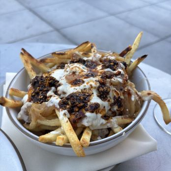 Side A - Cheese Fries with onions, chili crisp, and garlic aioli - Wine Bars Near Me - San Francisco, California Side A - Cheese Fries with onions, chili crisp, and garlic aioli - Wine Bars Near Me - San Francisco, California