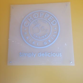 Chopped Halal Grill - a sign on the wall - Halal Near Me - Richardson, Texas