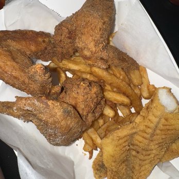 Ray's Chicken and Fish - 2 way combo: red snapper & wings with fries (i started eating already lol) it doesn't look like much but the plate is deep& huge - Fish & Chips Near Me - Sacramento, California Ray's Chicken and Fish - 2 way combo: red snapper & wings with fries (i started eating already lol) it doesn't look like much but the plate is deep& huge - Fish & Chips Near Me - Sacramento, California