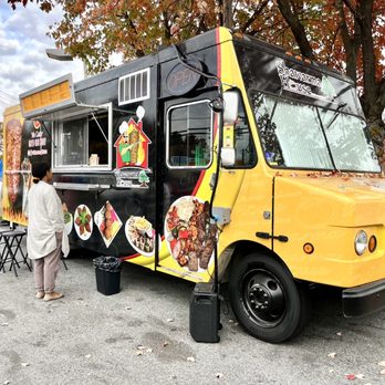 Shawarma House - a woman standing in front of a food truck - Food Trucks Near Me - Alexandria, Virginia Shawarma House - a woman standing in front of a food truck - Food Trucks Near Me - Alexandria, Virginia
