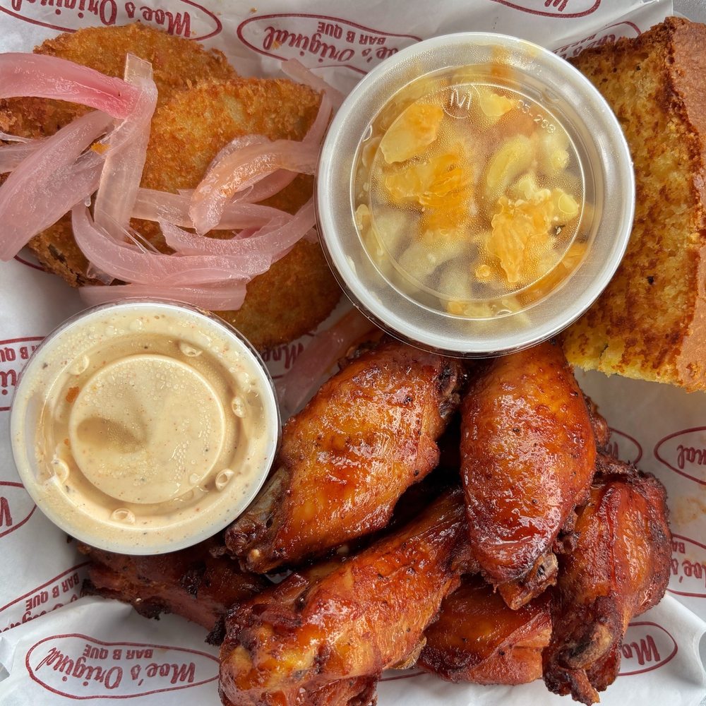 Smoked Chicken Smoked Wings Platter with fried green tomatoes. Mac & cheese, corn bread, and spicy remoulade sauce. Smoked Chicken Smoked Wings Platter with fried green tomatoes. Mac & cheese, corn bread, and spicy remoulade sauce.