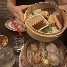 Special: appetizer sampler with soup dumplings, chicken dumplings, pork&shrimp dumplings, shrimp toast and spring rolls. Special: appetizer sampler with soup dumplings, chicken dumplings, pork&shrimp dumplings, shrimp toast and spring rolls.