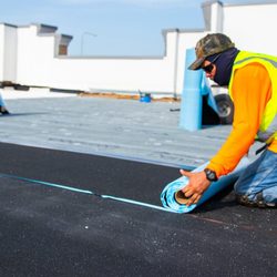 McAllen Valley Roofing - Modified bitumen flat roofing system installed by McAllen Valley Roofing Co., dependable commercial roofing contractor in Laredo, TX