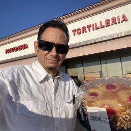 Exterior outside entrance of La Carreta Supermarkets - Pineapple cake ! - Orange, California Exterior outside entrance of La Carreta Supermarkets - Pineapple cake ! - Orange, California