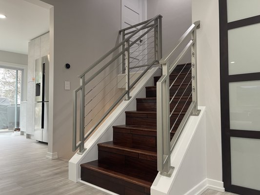 Custom Cable Railings For Interior Staircase - Our customer reached out to install a railing for her remodeled staircase.
She wanted something unique and chose a cable railing that has more customization that a common railing style. She also wanted a finish that looks like stainless steel.
The end result is amazing. Our customer is planning to work with us on her future projects. Custom Cable Railings For Interior Staircase - Our customer reached out to install a railing for her remodeled staircase.
She wanted something unique and chose a cable railing that has more customization that a common railing style. She also wanted a finish that looks like stainless steel.
The end result is amazing. Our customer is planning to work with us on her future projects.