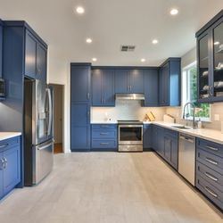 Studio 38 Designs - Our clients wanted a pop of color in their Kitchen. The Blue cabinets make a grand statement in this Kitchen remodel.