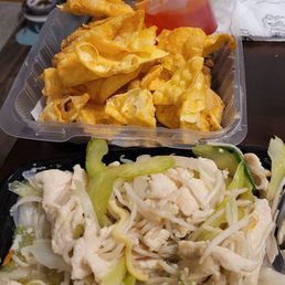 Chicken chow mein, fries wontons, and crispy noodles. Chicken chow mein, fries wontons, and crispy noodles.