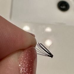 Miracle Threading & Spa - A cluster that was attached incorrectly to one real lash