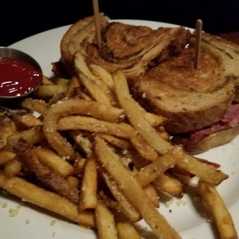 Redmond's Bar & Grill - Pastrami stack sandwich and Parmesan Garlic Fries - American Near Me - Redmond, Washington Redmond's Bar & Grill - Pastrami stack sandwich and Parmesan Garlic Fries - American Near Me - Redmond, Washington