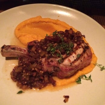 Finch & Fork - New item on the menu, pork chop! It was amazing, bacon topping with prefect paired puree. Super tender for such a thick cut! - New American Near Me - Santa Barbara, California