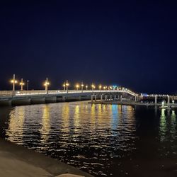 Bridge of Lions - Beautiful nighttime shot of the night lights reflecting on the river below.