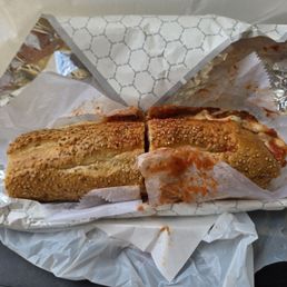 A massive and elite half chicken parm