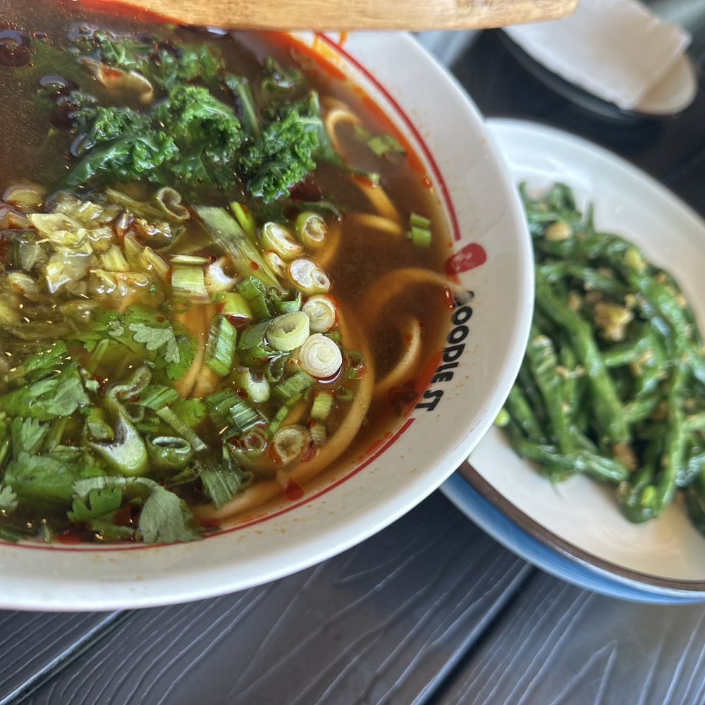 Noodle St - Spicy Beef Noodle with a new item of garlic green beans with dried radish. Nicely balances with the kale in the soup. - Noodles Near Me - Fullerton, California