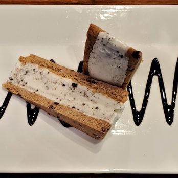 Warriors Taphouse - This is their Cookies and Cream Nightingale Gourmet Ice Cream Sandwich. Photo taken February 6, 2020. - Bars Near Me - Virginia Beach, Virginia Warriors Taphouse - This is their Cookies and Cream Nightingale Gourmet Ice Cream Sandwich. Photo taken February 6, 2020. - Bars Near Me - Virginia Beach, Virginia