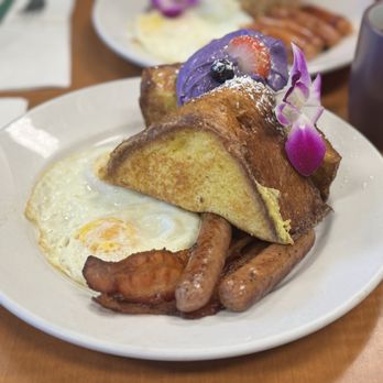 Guieb Cafe - Daily special (French toast with ube mascarpone, chicken mango ? sausages, eggs over medium and bacon. - New American Near Me - Honolulu, Hawaii Guieb Cafe - Daily special (French toast with ube mascarpone, chicken mango ? sausages, eggs over medium and bacon. - New American Near Me - Honolulu, Hawaii