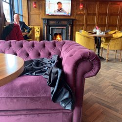 Merchant Bar and Grill - Cosy low seats with an impressive fire in the corner.