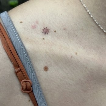 Embassy Tattoo - Poorly done tattoo by Isis - Piercing Near Me - Washington, DC, District of Columbia