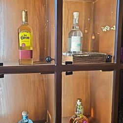 The Egg and Tequila Bar - Set right next to this curio cabinet filled w/ many varieties of tequila.