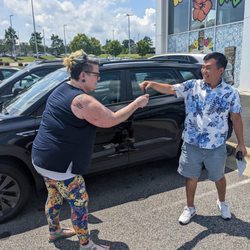 Leith Volkswagen of Raleigh - The ever amazing Min Kim handing over the keys to my new VW Taos.
