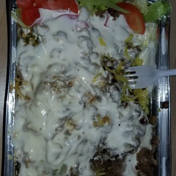 Middle Eastern Halal Food - Mix (chicken& lamb) over rice, with salad & covered in white sauce. - Halal Near Me - Brooklyn, New York Middle Eastern Halal Food - Mix (chicken& lamb) over rice, with salad & covered in white sauce. - Halal Near Me - Brooklyn, New York