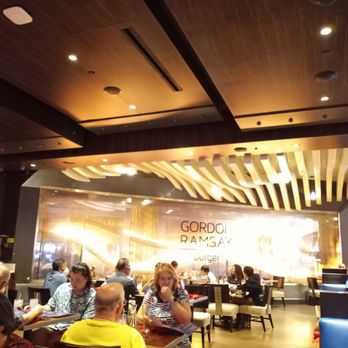 Gordon Ramsay Burger Las Vegas - Flames as you enter the restaurant. Tables along the glass wall are quite warm. - Burgers Near Me - Las Vegas, Nevada Gordon Ramsay Burger Las Vegas - Flames as you enter the restaurant. Tables along the glass wall are quite warm. - Burgers Near Me - Las Vegas, Nevada