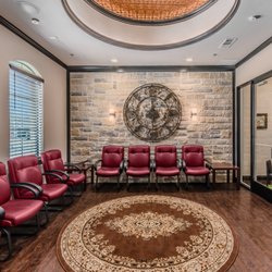 MD FirstWatch - Waiting area with snack bar, big screen TV, kids corner, and fireplace.