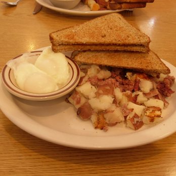 Six Chicks Scratch Kitchen - Corned beef hash, poached eggs, & wheat toast. - New American Near Me - South Haven, Michigan Six Chicks Scratch Kitchen - Corned beef hash, poached eggs, & wheat toast. - New American Near Me - South Haven, Michigan