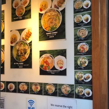 Ramen Nakamura - Wall filled with photos of menu items - Ramen Near Me - Honolulu, Hawaii