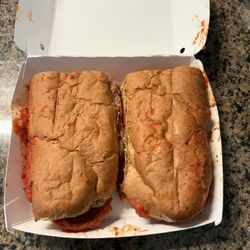 Pizza hoagie with sauce on the outside. Not appetizing at all.