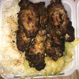 Jerk Wing Dinner with wet white rice Jerk Wing Dinner with wet white rice